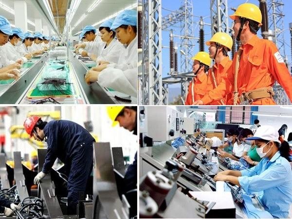 Several people working in a factory
Description automatically generated