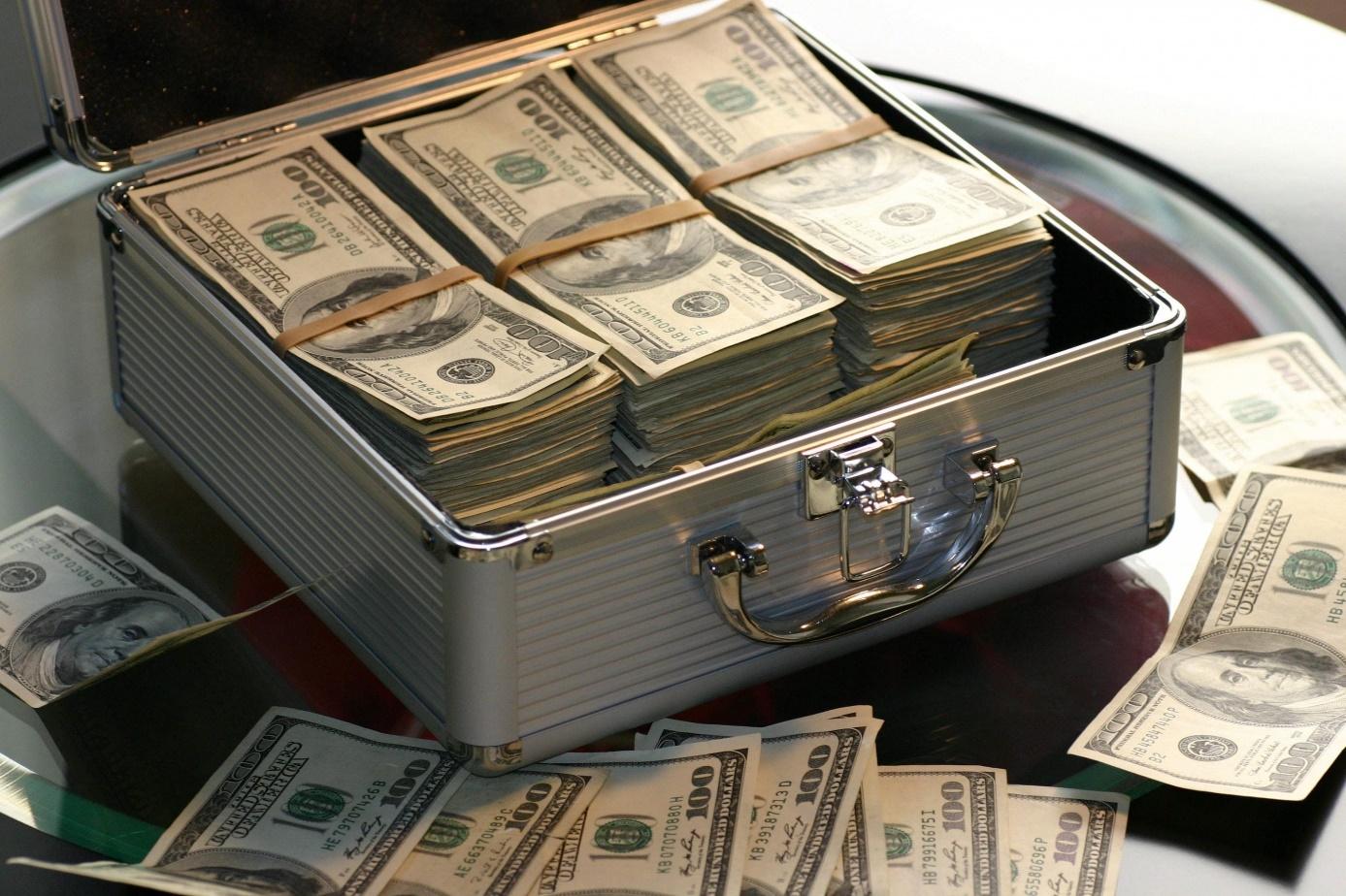A briefcase full of money

AI-generated content may be incorrect.