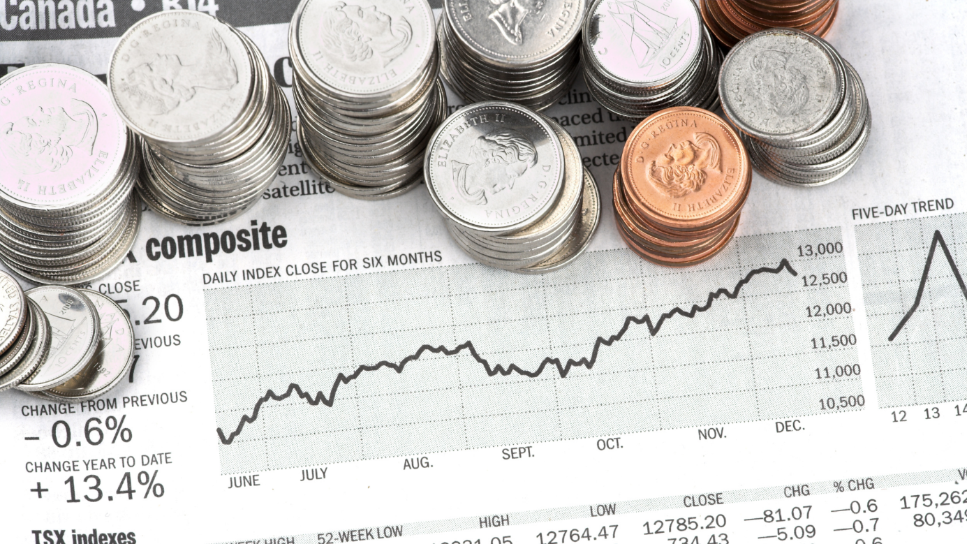 A stack of coins on a newspaper

AI-generated content may be incorrect.