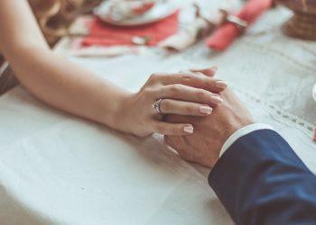 A person and person holding hands

Description automatically generated
